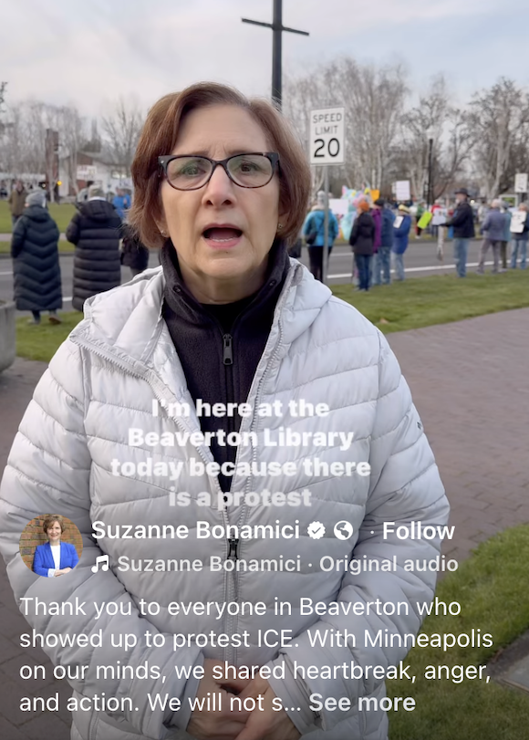 Suzanne speaking to camera at a protest in Beaverton